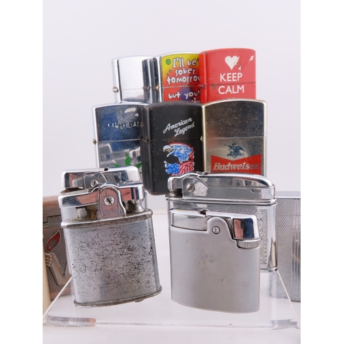 139 - Collection of vintage and novelty cigarette lighters, enamel novelty lighters, Budweiser and America... 