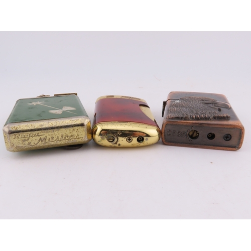 140 - Three vintage lighters, green enamel starburst lighter, copper tone eagle lighter and tortoiseshell ... 