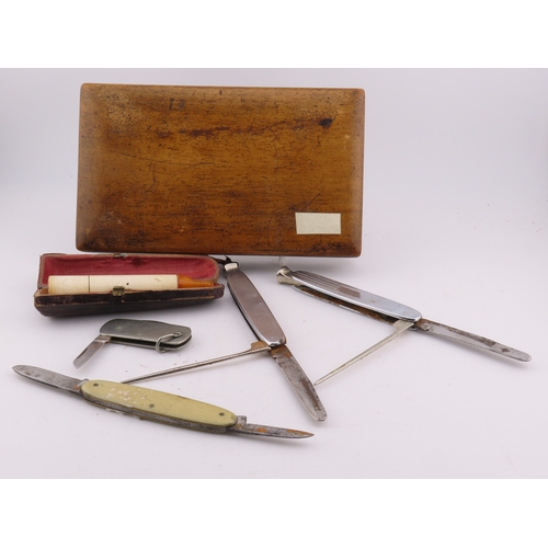 143 - Five vintage pocket knives and a wooden box  folding knives in silver tone, bone and metal  one case... 