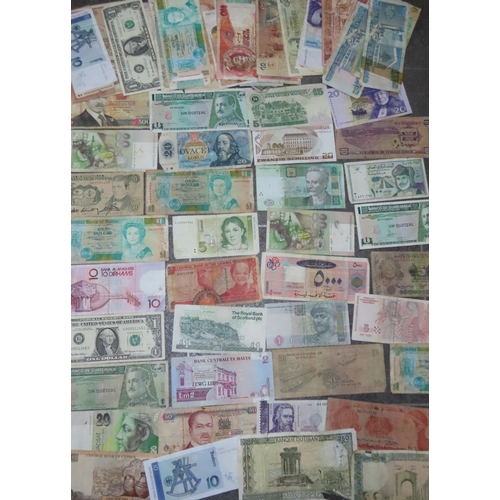 160 - Collection of world banknotes  international banknotes from multiple regions in mixed condition.