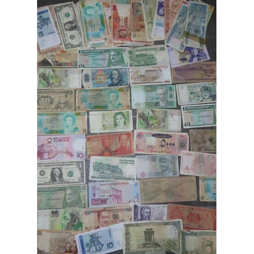 160 - Collection of world banknotes  international banknotes from multiple regions in mixed condition.