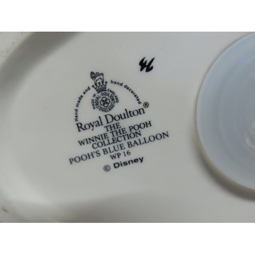 177 - Collection of Winnie the Pooh porcelain and ceramic figures and bookends, including table group scen... 