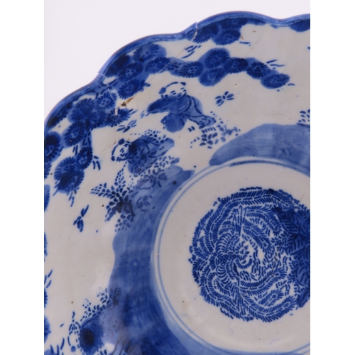 182 - Oriental Blue and white porcelain dish of scalloped circular form, printed with floral sprays and ce... 