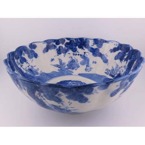182 - Oriental Blue and white porcelain dish of scalloped circular form, printed with floral sprays and ce... 