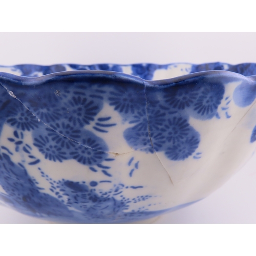 182 - Oriental Blue and white porcelain dish of scalloped circular form, printed with floral sprays and ce... 