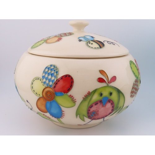 185 - Moorcroft nurseryware covered jar by Nicola Slaney together with a Tiffany and Co porcelain trinket ... 