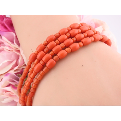 14 - Multi strand coral bracelet with fourteen carat gold clasp Dutch hallmark pre 1906. A beautiful mult... 