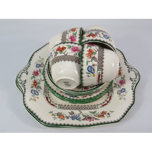 237 - Spode tableware set including serving plates, saucers, and cups in multicolour floral pattern.