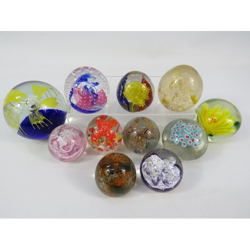 244 - Collection of glass paperweights, largest approx 4 inches; includes some Caithness.