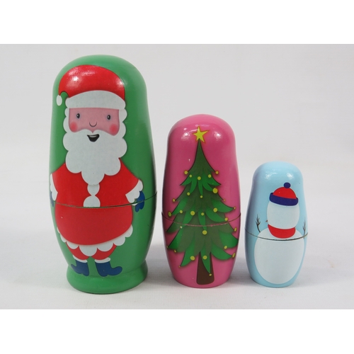 249 - Set of nesting dolls incl. Santa, tallest approx 6 inches