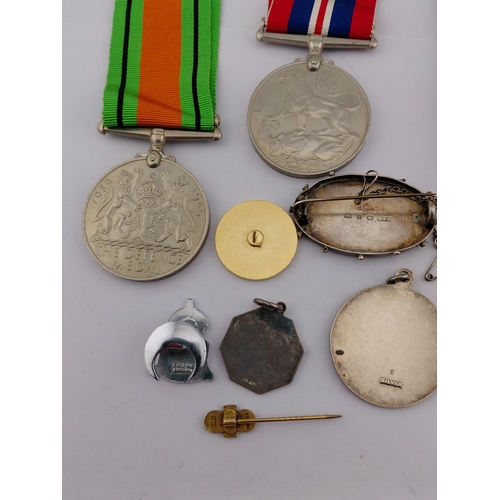 222 - Two WW2 Medals, Defence and 39-45, Two Small hallmarked Silver Fobs and Hallmarked Silver Brooch plu... 