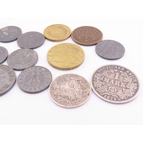 296 - A small selection of German coins dating from 1875 to the 1940s, including mixed denominations.