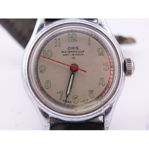 300 - Two wristwatches comprising a Monarch wristwatch in running order and an Oris wristwatch offered for... 