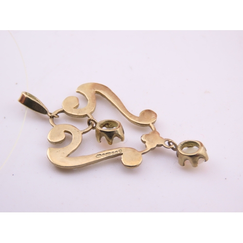 312 - A 9ct gold pendant of openwork heart form, set with opals and seed pearls. The stones displaying cha... 