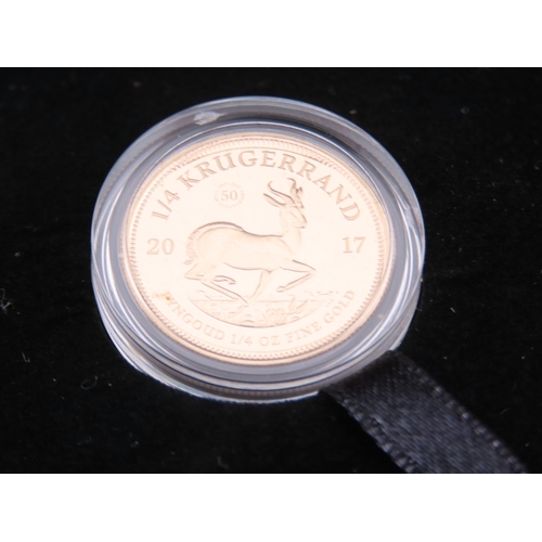 105 - A 2017 South African quarter ounce gold Krugerrand, struck to proof standard. The obverse depicts th... 
