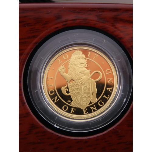 121 - The Royal Mint Queens Beasts The Lion of England gold proof coin. A United Kingdom 25 pound gold pro... 