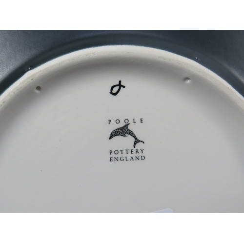 11 - Poole Pottery Galaxy charger with red abstract spots on black ground, 41cm diameter