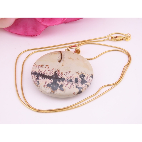166 - 9ct Gold Dendritic Agate Pendant Necklace. A 9ct gold pendant set with a dendritic agate plaque disp... 