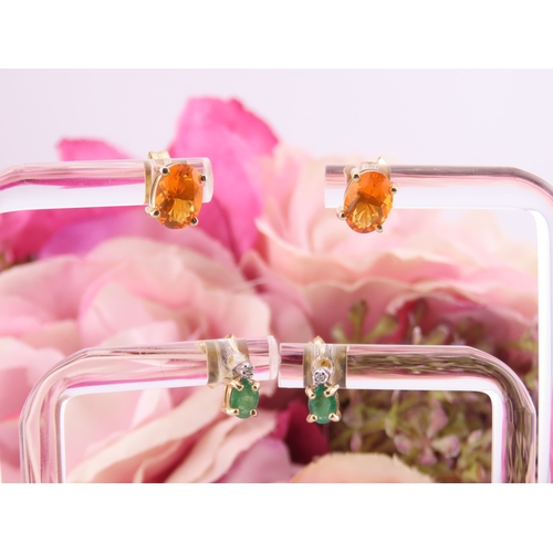 176 - Two Pairs of 9ct Gold Earrings. One pair set with fire opals and the other with emeralds both fitted... 