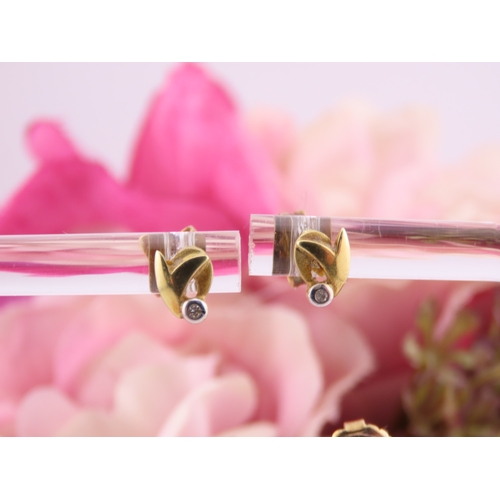 177 - Two Pairs of 18ct Gold Earrings. One pair of swirl design and the other of polished knot form both w... 