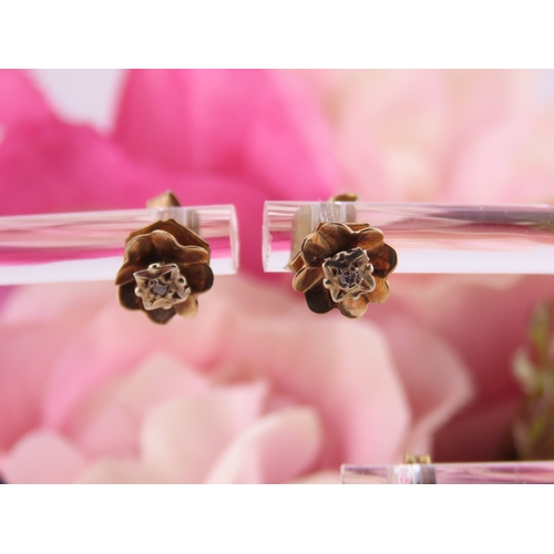 178 - Two Pairs of 9ct Gold Earrings. One pair of drop form and the second pair of stud design both with p... 