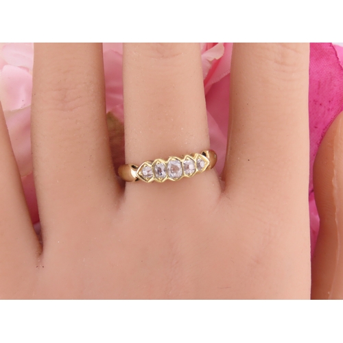 184 - 18ct Gold Antique Diamond Ring. Set with a row of cushion cut diamonds with an estimated combined we... 