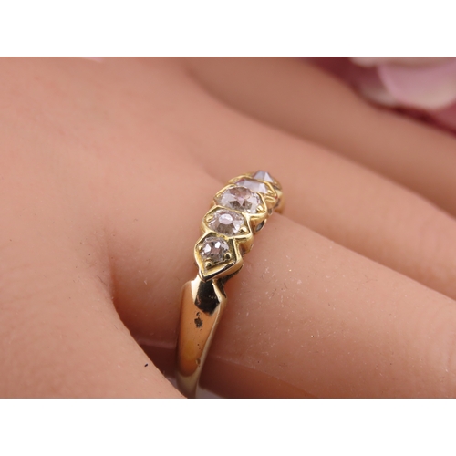 184 - 18ct Gold Antique Diamond Ring. Set with a row of cushion cut diamonds with an estimated combined we... 