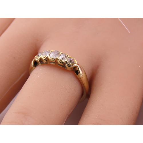 184 - 18ct Gold Antique Diamond Ring. Set with a row of cushion cut diamonds with an estimated combined we... 