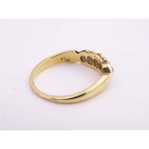 184 - 18ct Gold Antique Diamond Ring. Set with a row of cushion cut diamonds with an estimated combined we... 
