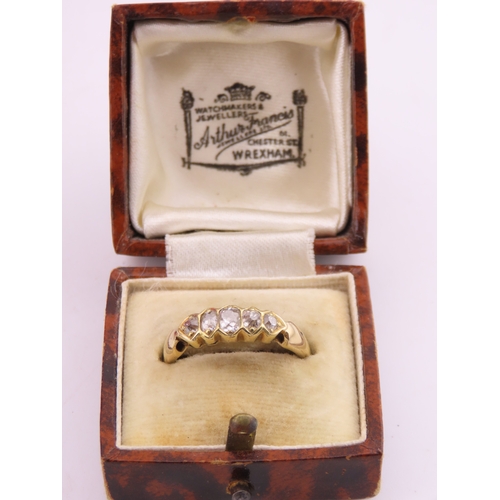 184 - 18ct Gold Antique Diamond Ring. Set with a row of cushion cut diamonds with an estimated combined we... 