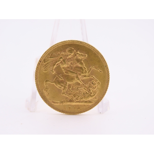 187 - A gold full sovereign dated 1913, struck in 22 carat gold and featuring the St George and the Dragon... 