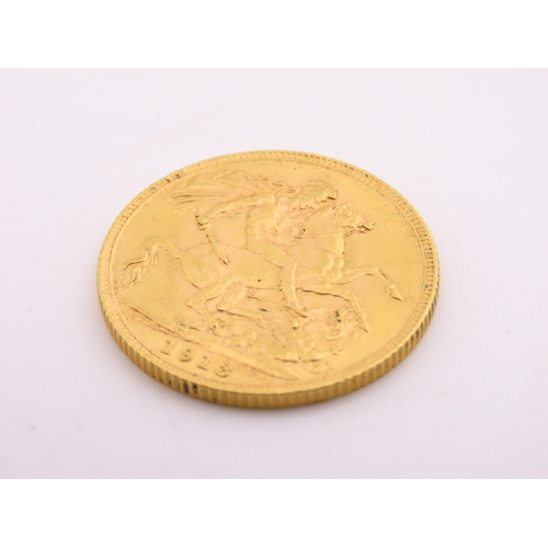 187 - A gold full sovereign dated 1913, struck in 22 carat gold and featuring the St George and the Dragon... 