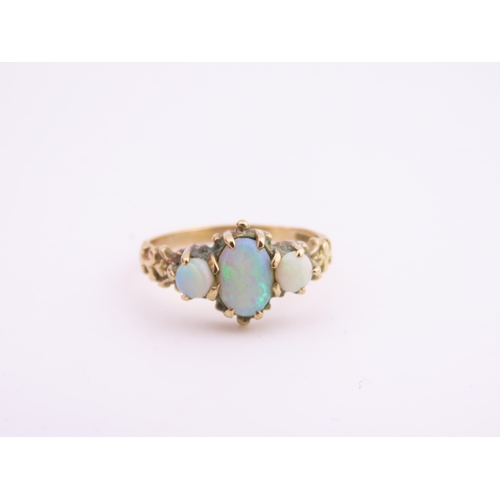 190 - A 9 carat gold opal trilogy ring, set with three graduated oval cabochon opals displaying characteri... 