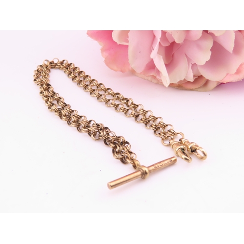 194 - A 9 carat gold chain necklace, fitted with double lobster clasp terminals and an additional T bar fa... 
