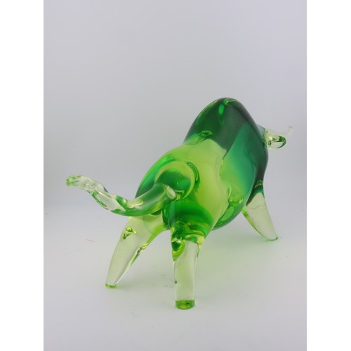 98 - A large Murano uranium glass bull figure, of elongated form, with graduated green and yellow tones. ... 