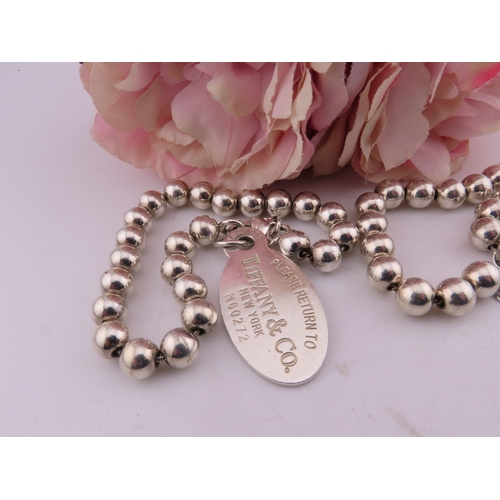 135a - Two Bracelets marked Tiffany and co 925, total weight 111 grams.