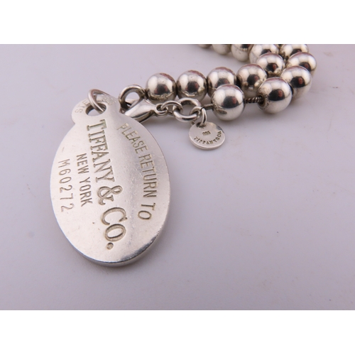 135a - Two Bracelets marked Tiffany and co 925, total weight 111 grams.