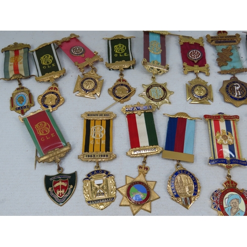 998 - A large selection of Masonic medals and badges, comprising enamelled and gilt metal examples with ri... 