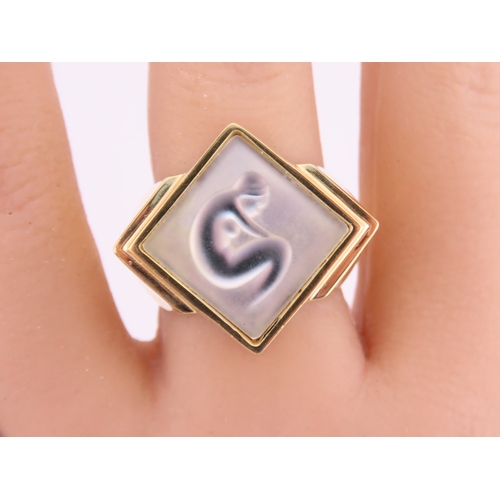 240 - A Lalique gold tone ring, of bold square form set with a frosted glass panel, signed Lalique, comple... 