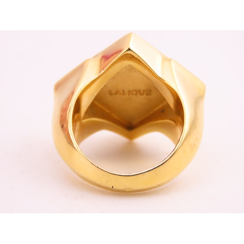 240 - A Lalique gold tone ring, of bold square form set with a frosted glass panel, signed Lalique, comple... 