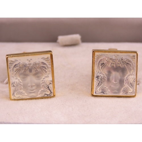 241 - A pair of Lalique gold tone cufflinks, each of square form set with frosted glass panels, signed Lal... 