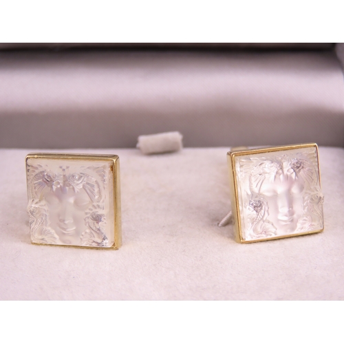 241 - A pair of Lalique gold tone cufflinks, each of square form set with frosted glass panels, signed Lal... 