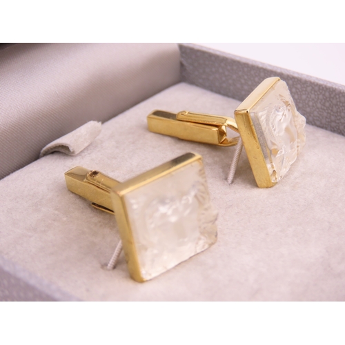 241 - A pair of Lalique gold tone cufflinks, each of square form set with frosted glass panels, signed Lal... 