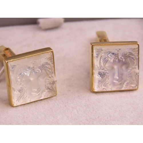 241 - A pair of Lalique gold tone cufflinks, each of square form set with frosted glass panels, signed Lal... 