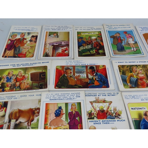 A collection of twenty seven Bamforth and other humorous postcards ...