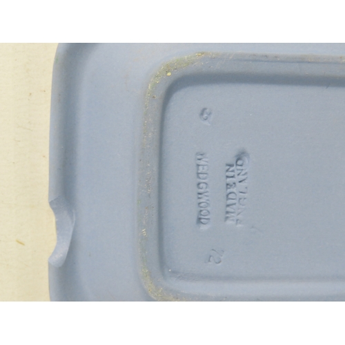 856 - Seven items of Wedgwood blue Jasperware including trinket boxes, small vase, tankard, tray and candl... 