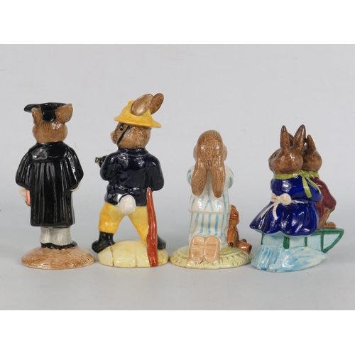 41 - Four boxed Royal Doulton Bunnykins figurines including Bedtime, Tyrolean Easter and graduate/fireman... 