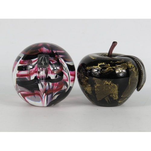 42 - Two Langham glass paperweights - one with pink and white swirl design, the other an apple form with ... 