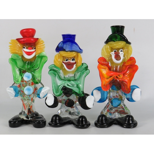 45 - Three Murano glass clown figurines in red, blue and green top hats with bright multicoloured bodies ... 