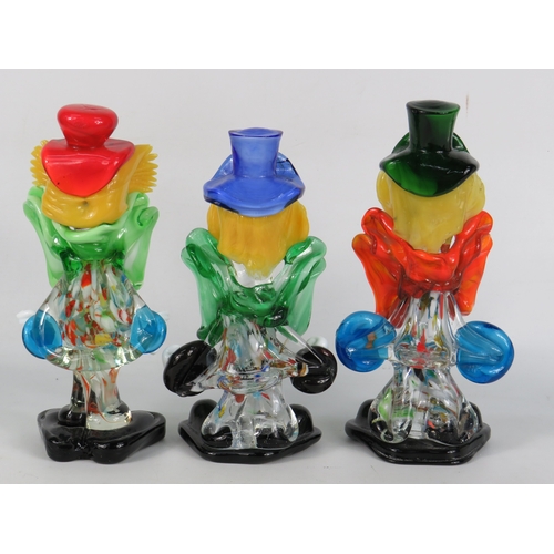 45 - Three Murano glass clown figurines in red, blue and green top hats with bright multicoloured bodies ... 
